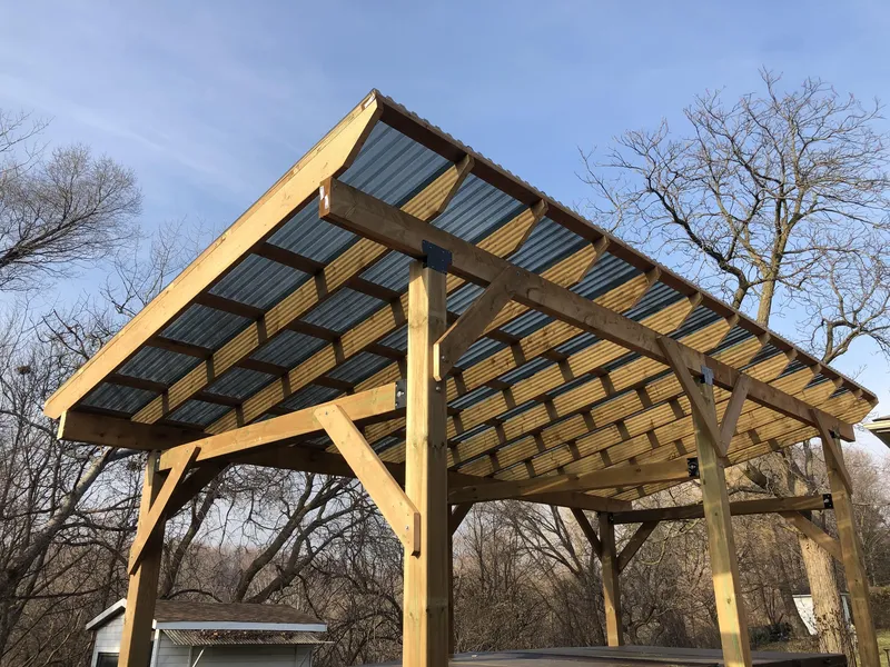 Custom cedar pergola over a backyard patio